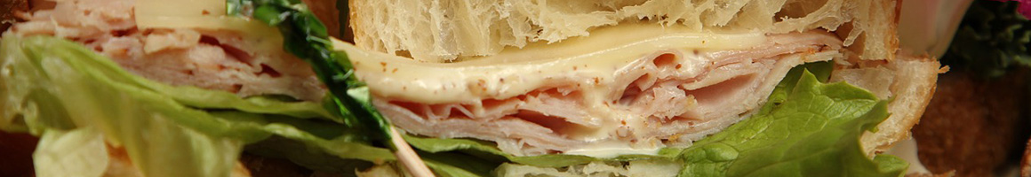 Eating Sandwich Cafe Bakery at swissbakers restaurant in Boston, MA.